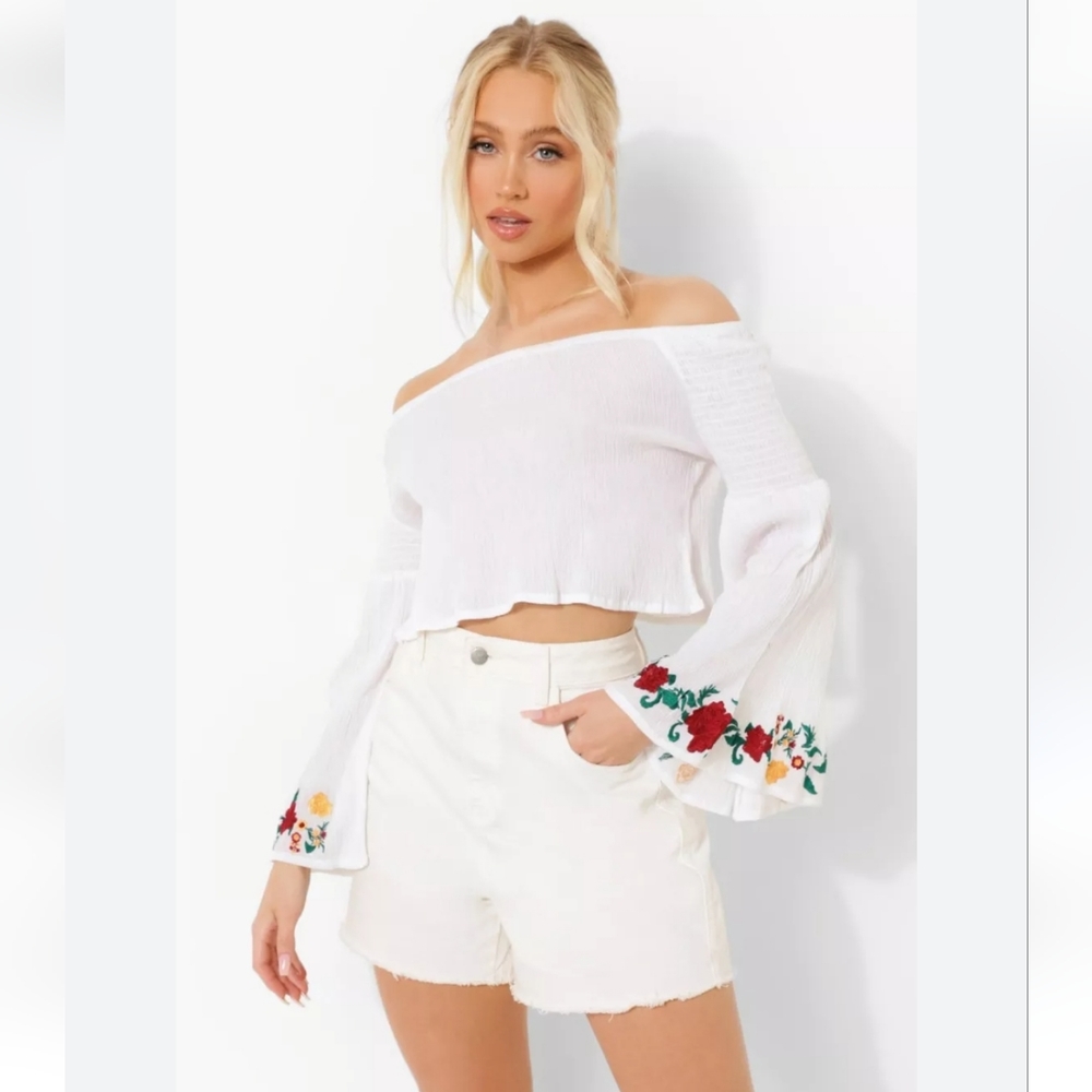 Embroidered bell sleeve top